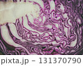 A slice of red raw cabbage. Abstract vegetable background 131370790