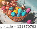 Colorful easter eggs in a basket on wooden table 131370792