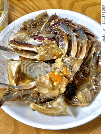 Ganjang Gejang, a Korean delicacy, consists of raw crabs marinated in soy sauce, offering a savory, umami-packed flavor. A must-try for seafood lovers, it's often served with rice. Ganjang Gejang, a Korean delicacy, consists of raw crabs marinated in soy sauce, offering a savory, umami-packed flavor. A must-try for seafood lovers, it's often served with rice. 131371004
