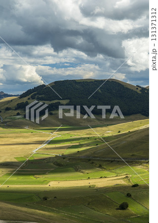 Hills and green fields in Castelsantangelo sul Nera, Italy Hills and green fields in Castelsantangelo sul Nera, Italy 131371312