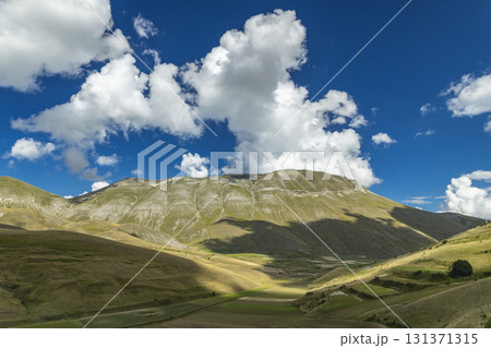 Sibylline mountains and plains of Castelluccio di Norcia, Umbria, Italy 131371315