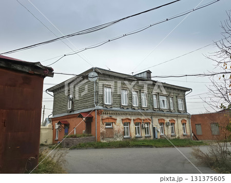 Charming Old Wood and Brick Building Facade 131375605