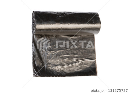 New black plastic garbage bags in roll for waste collection and storage isolated on white background 131375727