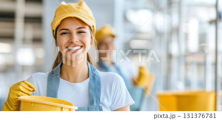 Latin american young woman cleaning in kitchen with mop and gloves, concept of cleaning service, housework and hygiene 131376781
