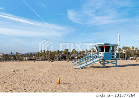 Classic lifeguard tower on a sandy beach 131377264