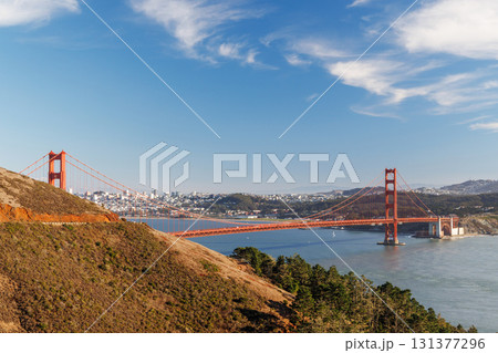 Iconic view of the Golden Gate Bridge bathed in warm sunlight 131377296