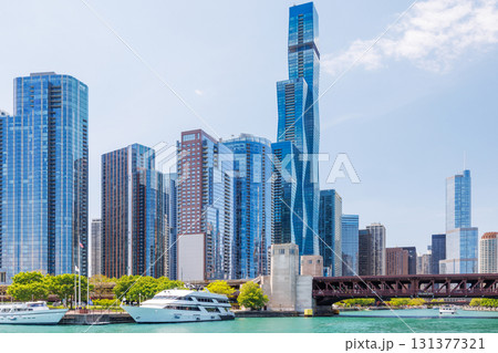 Vibrant sunny view of Chicago downtown skyline under a blue sky Vibrant sunny view of Chicago downtown skyline under a blue sky 131377321