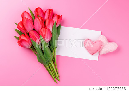 Pink tulip bouquet with a handmade hearts and blank greeting card Pink tulip bouquet with a handmade hearts and blank greeting card 131377628