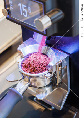 Ground coffee in portafilter ready for brewing 131377630