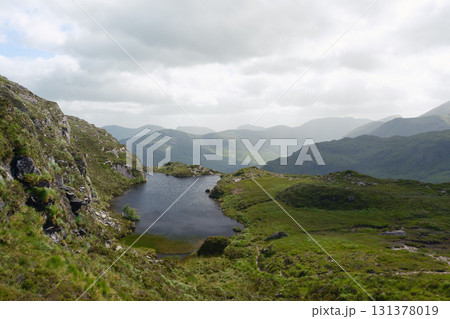 Panoramic view of a stunning mountain range. Peaceful, tranquil, and inspiring nature. 131378019
