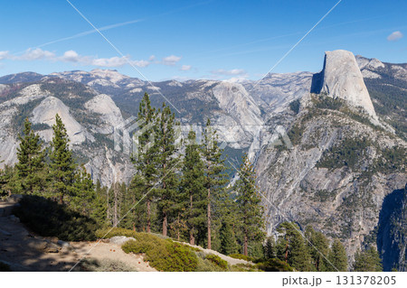 Scenic summer landscape in Yosemite National Park with mountains, forest, and sky 131378205