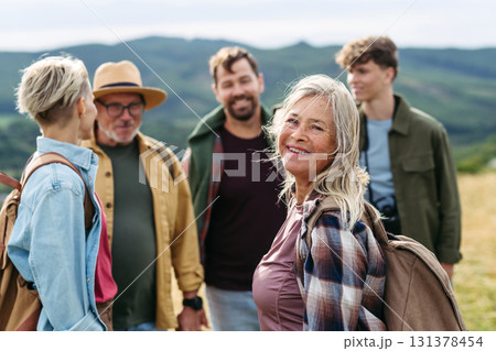 Multigenerational family on hiking trip in nature. 131378454