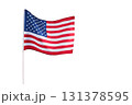 Stars and stripes waving flag of the United States isolated on white background. American flag is excellent for 4th of July, Veterans Day, and graphic design use. 131378595