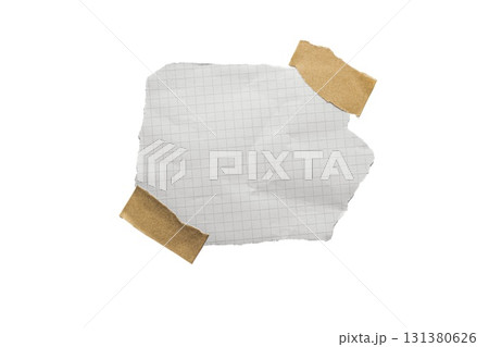 Torn piece of school notebook in a cage with beige tape isolated on white background 131380626