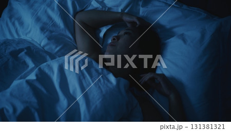 Young Tired Woman With Anxious Thoughts Cannot Sleep at Night Young Tired Woman With Anxious Thoughts Cannot Sleep at Night 131381321