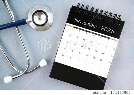 November 2026 calendar and stethoscope, Medical appointment schedule to check up concept. November 2026 calendar and stethoscope, Medical appointment schedule to check up concept. 131383963