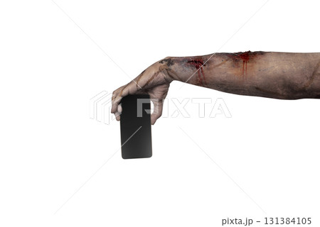 The zombies hand with wounds and blood holding a cellphone isolated over a white background. Zombie, devil, evil, satan, or monster hand. Mockup or Copy space. Concept of Halloween or Horror 131384105