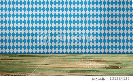 Top view of a blue checkered tablecloth or napkin with a wooden table background. Copy space. Concept of Oktoberfest. Bavarian German culture festival decoration symbol 131384125