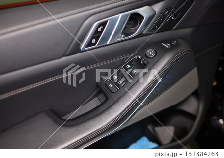 Modern Car Door Control Panel with Window Switches for convenience and functionality Modern Car Door Control Panel with Window Switches for convenience and functionality 131384263