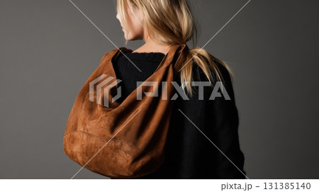 Chic woman with brown bag 131385140