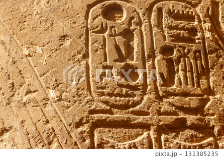 Ancient egyptian hieroglyphs on the wall in Karnak Temple Complex in Luxor, Egypt Ancient egyptian hieroglyphs on the wall in Karnak Temple Complex in Luxor, Egypt 131385235