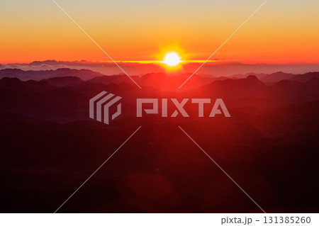 Beautiful sunrise on a top of Mount Sinai (Moses Mount) in Egypt Beautiful sunrise on a top of Mount Sinai (Moses Mount) in Egypt 131385260