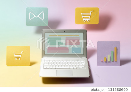 Open laptop displaying newsletter template with marketing icons and copy space for design 131388690