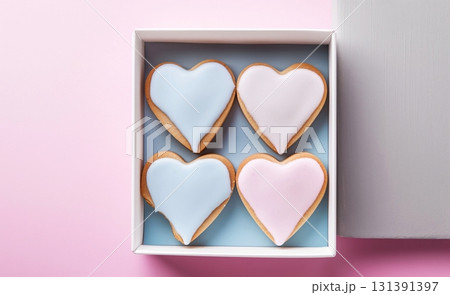Heart shaped cookies in a gift box on a pink background, Valentine's Day Heart shaped cookies in a gift box on a pink background, Valentine's Day 131391397