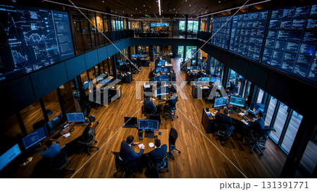 Modern Trading Floor with Multiple Screens and Active Traders in a Contemporary Office Space 131391771