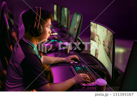 ESports Gamer Engaging and Competing in the Modern Gaming Environment and Arena 131393167