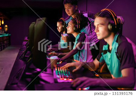 Competitive Gamers in Full Action Display at the Thrilling Esports Tournament Event 131393176