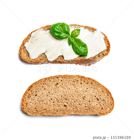 Bread with butter and slice of bread on white 131396189