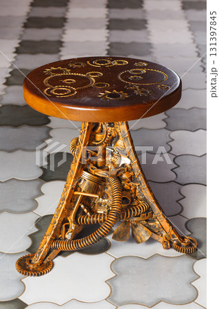 A round steampunk and technopunk style barstool 131397845
