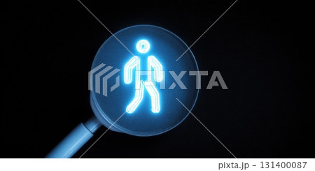 Pedestrian crossing sign glowing blue in darkness 131400087