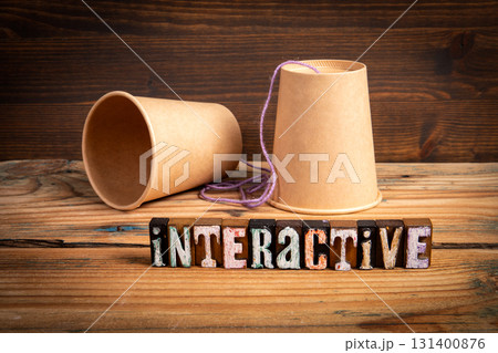 Interactive Communication Concept with String Phone and Rustic Wooden Background 131400876
