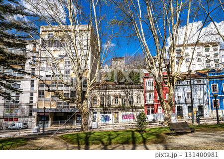 Walking along the streets in historic Coimbra, Portugal's most important university town and old capital. Baixa streets in medieval quarter. 131400981