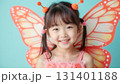 Adorable little girl dressed up as a butterfly 131401188