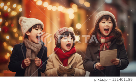 Happy children singing christmas carols 131401189
