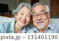 Happy elderly couple at home 131401190