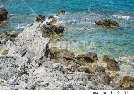 Picturesque beach with turquoise water and massive rocks in Crete Picturesque beach with turquoise water and massive rocks in Crete 131401512