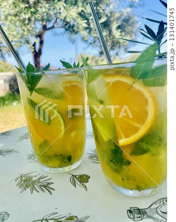Refreshing Orange Mojito by the Pool Refreshing Orange Mojito by the Pool 131401745