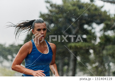 Unstoppable: A Determined Athlete Trains Through the Rain in Pursuit of Marathon Glory Unstoppable: A Determined Athlete Trains Through the Rain in Pursuit of Marathon Glory 131404119