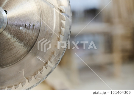 Close-Up of CNC Machine Precisely Cutting and Processing Wooden Boards 131404309