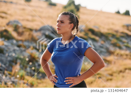 Determined Woman Athlete Preparing for Morning Run Determined Woman Athlete Preparing for Morning Run 131404647