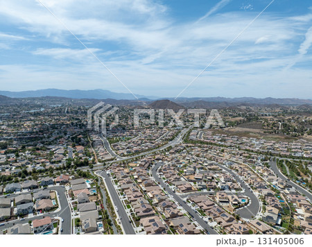 Aerial view of a sprawling neighborhood of family homes in Menifee, California, USA. Aerial view of a sprawling neighborhood of family homes in Menifee, California, USA. 131405006