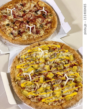 Hot and cheesy pizza slice with a crispy crust and savory toppings. A perfect mix of melty goodness and bold flavor for a satisfying comfort food favorite. Hot and cheesy pizza slice with a crispy crust and savory toppings. A perfect mix of melty goodness and bold flavor for a satisfying comfort food favorite. 131408485