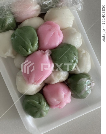 Soft and chewy kkultteok, Korean rice cakes filled with sweet honey, offering a delightful texture and a natural sweetness. A traditional treat perfect for snacks or special occasions. Soft and chewy kkultteok, Korean rice cakes filled with sweet honey, offering a delightful texture and a natural sweetness. A traditional treat perfect for snacks or special occasions. 131408850