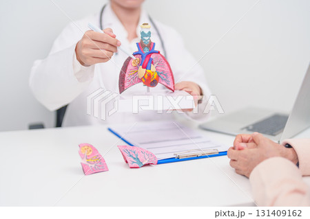 Doctor with Respiratory system. Elderly Patient consultation medical health for Lung Cancer, Asthma, Chronic Obstructive Pulmonary, Bronchitis, Emphysema, Cystic Fibrosis, Bronchiectasis, Pneumonia Doctor with Respiratory system. Elderly Patient consultation medical health for Lung Cancer, Asthma, Chronic Obstructive Pulmonary, Bronchitis, Emphysema, Cystic Fibrosis, Bronchiectasis, Pneumonia 131409162