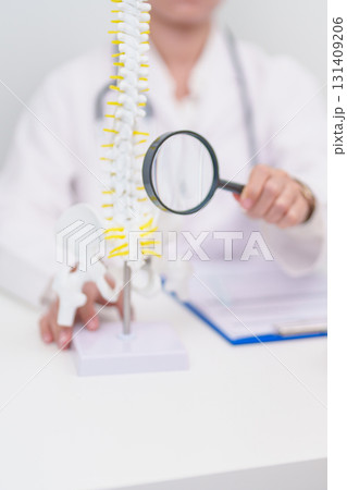 Elderly Patient consulting Doctor with Spine anatomy for Spinal Cord Disorder and disease, Back pain, Lumbar, Sacral pelvis, Cervical neck, Thoracic, Coccyx, Orthopedist, chiropractic, Office Syndrome Elderly Patient consulting Doctor with Spine anatomy for Spinal Cord Disorder and disease, Back pain, Lumbar, Sacral pelvis, Cervical neck, Thoracic, Coccyx, Orthopedist, chiropractic, Office Syndrome 131409206