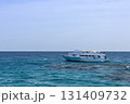 Tranquil ocean scene with sailboat in open sea as summer vacation inspiration 131409732